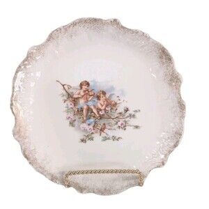 Vintage hand painted porcelain plate Two Cherubs  Amidst Branches & Flowers